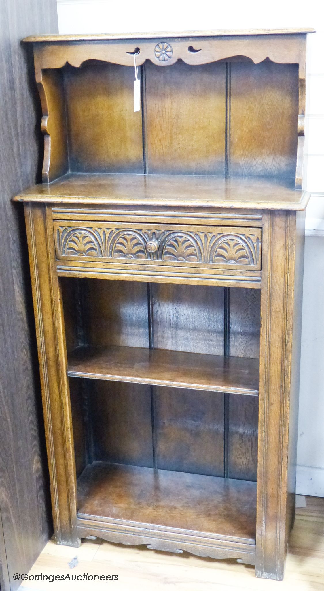 An ‘Ipswich oak’ narrow bookcase, 69 cm wide, 136 cm high, 29 cm deep